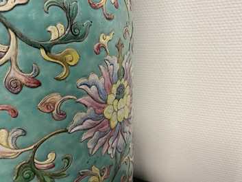 A large Chinese famille rose cylindrical vase with applied lotus scrolls, Jiaqing/Daoguang